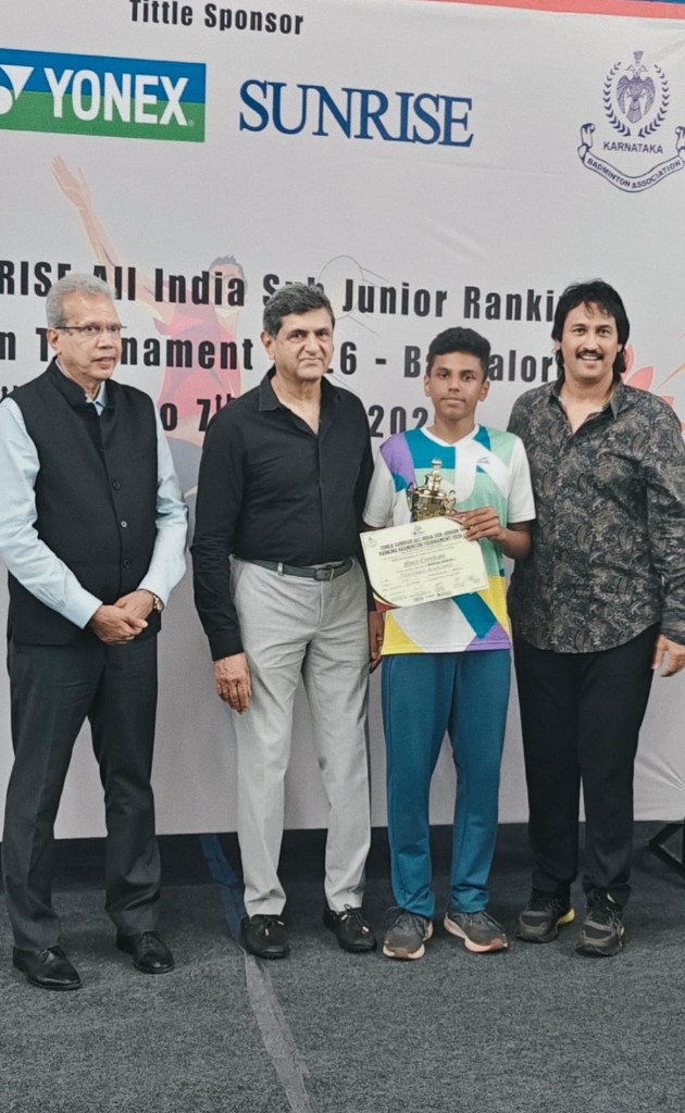 Mohit with silver medal trophy at the National Badminton Tournament in Bangalore